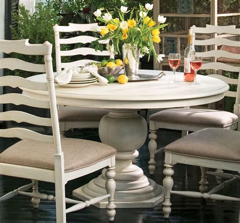 We wanted a round table that would seat a full monopoly game. Paula Deen Home Linen Round Pedestal Extendable Dining ...