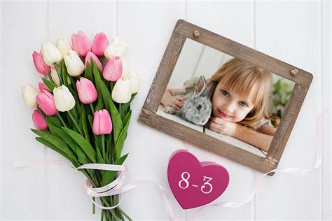 Pregnant woman holding tulips near smiling husband isolated on white, banner. Flower Frame 8 March International Womens Day Online