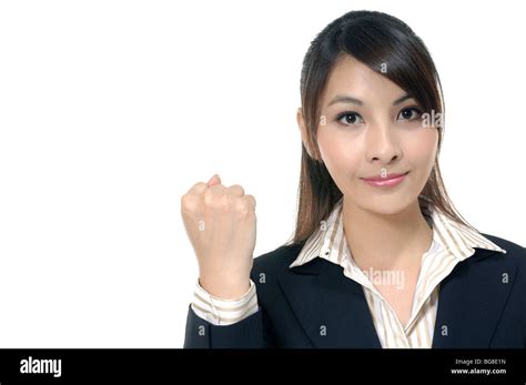 Businesswoman Clenching Her Fist Stock Photo Alamy