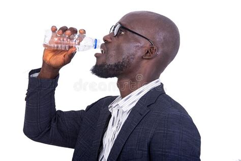 Handsome Adult Businessman Drinking Water From Plastic Bottle Stock