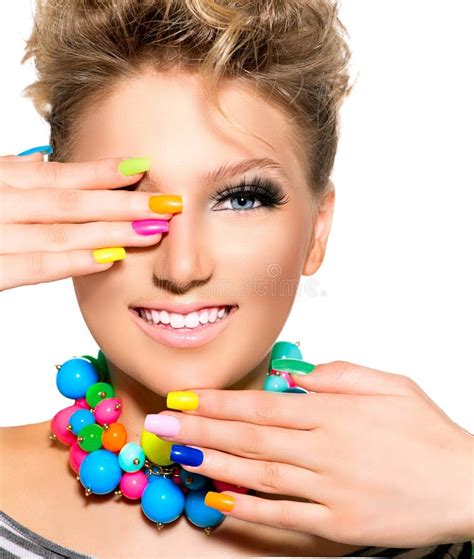 Girl With Fashion Hairstyle And Colorful Nail Polish Stock Image