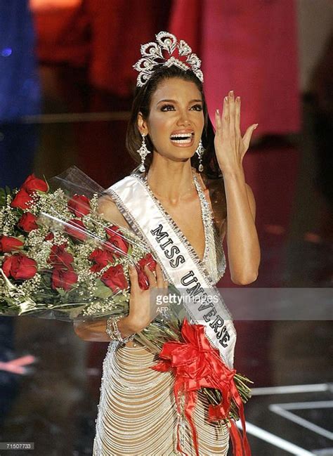 Miss Usa Contestant Waves To The Crowd As She Walks Down The Runway