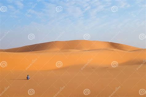A Man Alone In A Vast Desert Landscape Stock Photo Image Of Arab