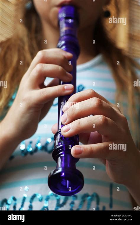 A Child Playing The Recorder Stock Photo Alamy