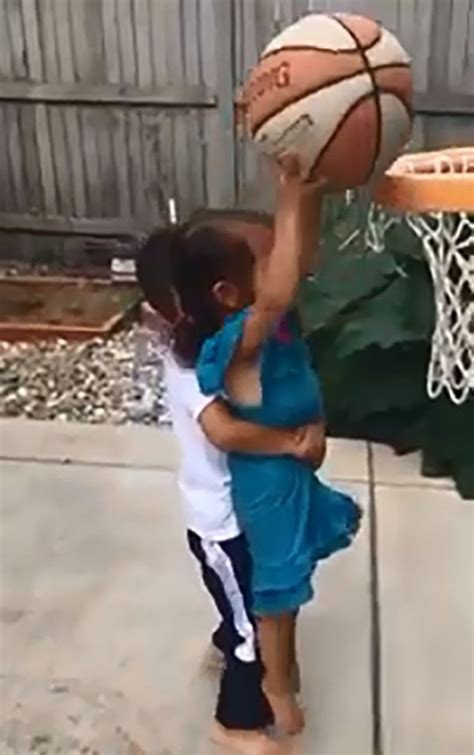 heartwarming moment brother encourages his little sister in basketball game metro news