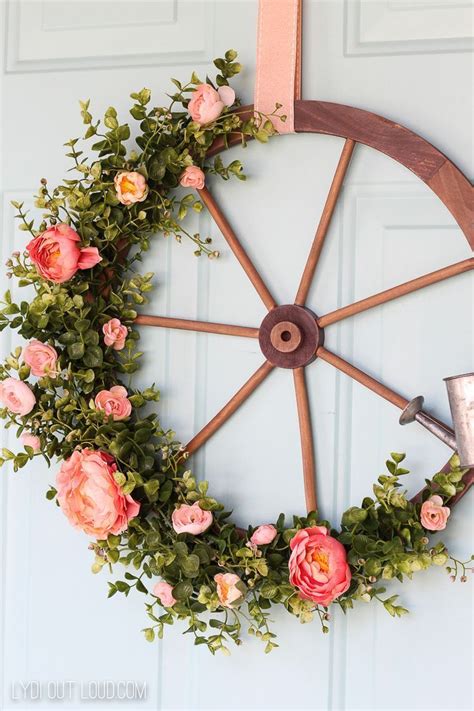 Wagon wheels create a decorative western or rustic look in any home or business. Wagon Wheel Farmhouse Style Wreath Tutorial | Farmhouse ...