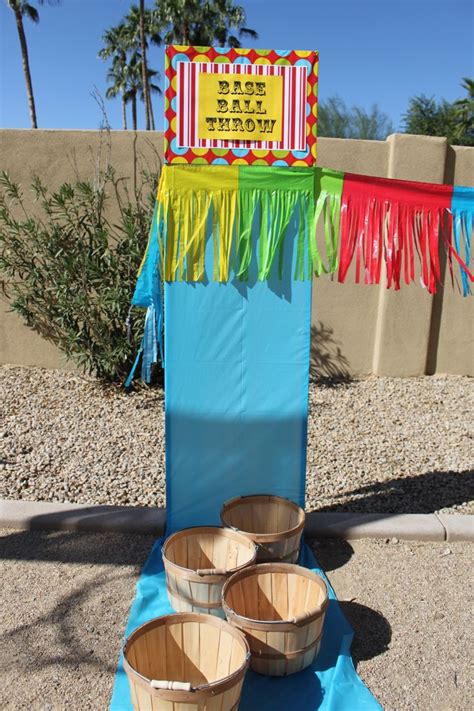 easy carnival games using 5 garden stakes wrapped foam board for sign stapled on over plastic