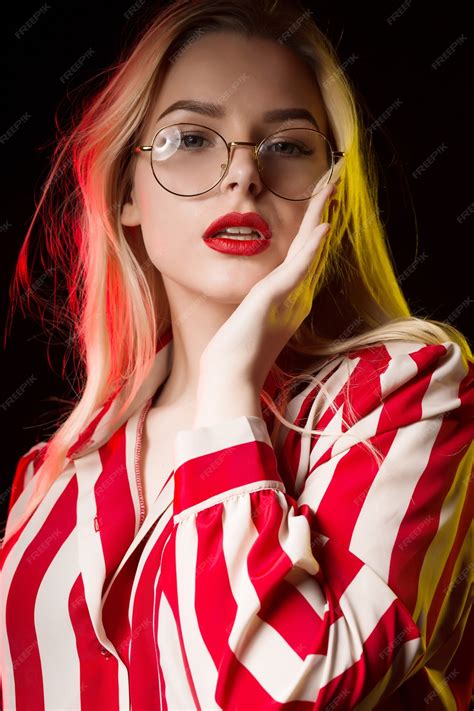 Premium Photo Adorable Blonde Girl Wearing Glasses Dressed In Trendy