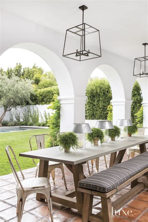 This style likes wooden or iron furniture that looks minimalistic. Spanish Colonial Neutral Patio with Dining Table | Spanish ...