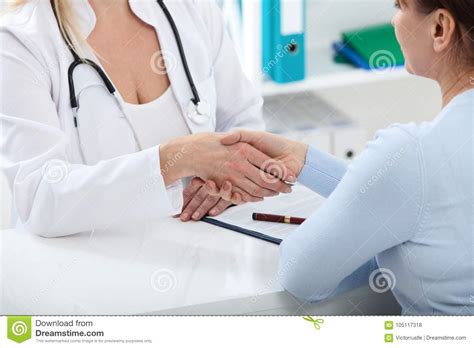 Healthcare And Medical Concept Doctor With Patient In Hospital
