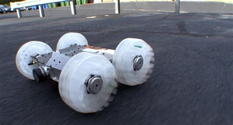 Sand Flea Robot Leaps Over One Story Buildings In A Single Bound