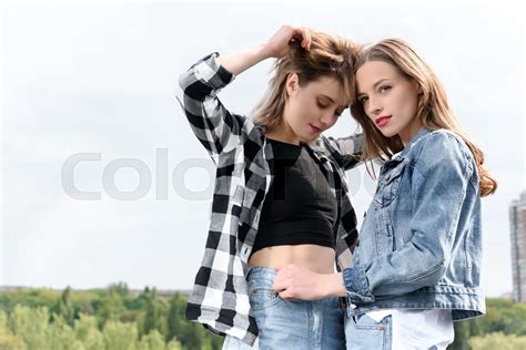 Young Stylish Lesbian Couple Standing Together Outdoors Stock Image Colourbox