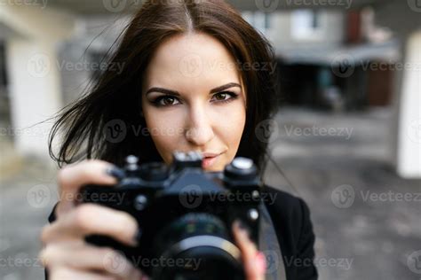 Beautiful Female Photographer Posing With Camera 11452709 Stock Photo