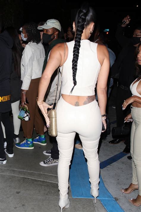 Draya Michele Shows Off Her Curves In An All White Ensemble As She Arrives To A Party In