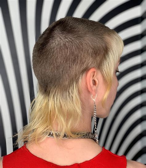 Young Woman With Chelsea Haircut Feathercut Buzzcut With Long Bangs