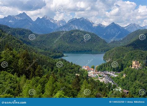 Mountain Landscape In The Bavarian Alps With Village Hohenschwangau