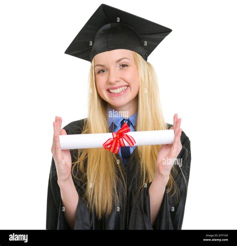 Smiling Young Woman In Graduation Gown Showing Diploma Stock Photo Alamy