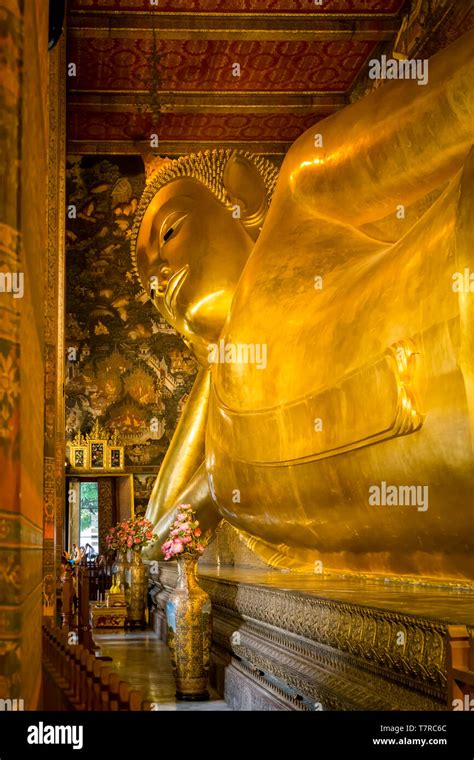 Golden Head And Body Of The Reclining Buddha Statue In Wat Pho Bangkok