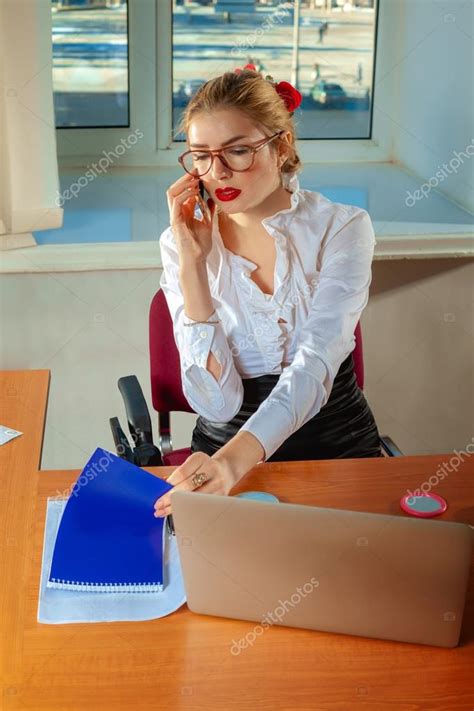Woman Secretary In An Office — Stock Photo © Ponomarencko 93659998