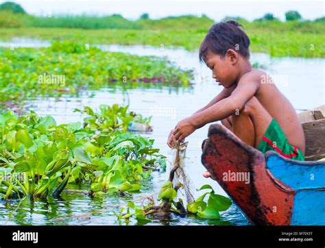 Cambodian Child In Tonle Sap Lake Cambodia Stock Photo Alamy