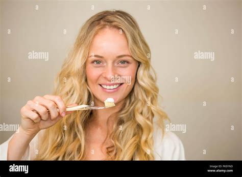 Beautiful Blonde About To Brush Her Teeth Stock Photo Alamy