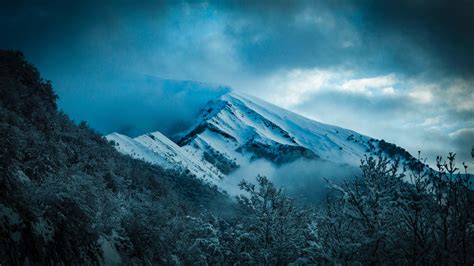 Scenic View Of Snowy Mountain · Free Stock Photo