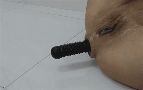 using her ass to push out dildo no hands