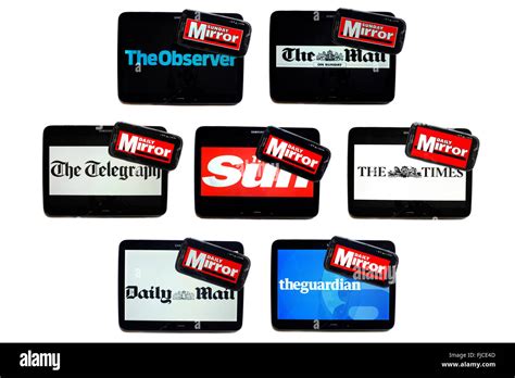 The Daily Mirror Newspaper Logo On Smartphone Screens Surrounded By