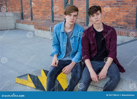 Bored Teenagers Boys On Street Stock Photo Image Of Close Outdoor