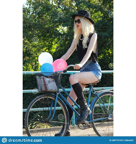 Young Attractive Blonde Girl Rides A Bike Stock Image Image Of Cute