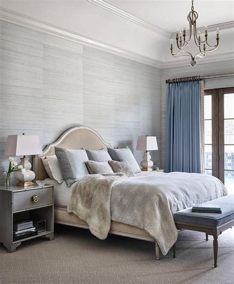 Gray And Blue Bedroom Features Walls Clad In Gray