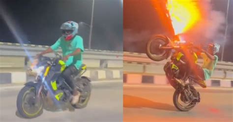 Watch Man Performs Dangerous Stunt On Bike With Firecrackers In Tamil