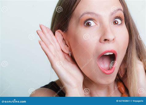 Shocked Gossip Girl Eavesdropping With Hand To Ear Stock Image Image