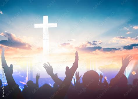 Worship And Praise Concept Christian People Hand Rising On Sunset