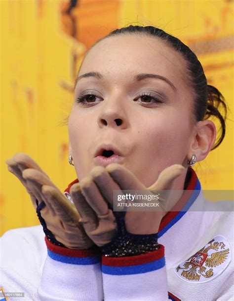 Russian Adelina Sotnikova Blows Kisses As She Waits For Her Points In News Photo Getty Images