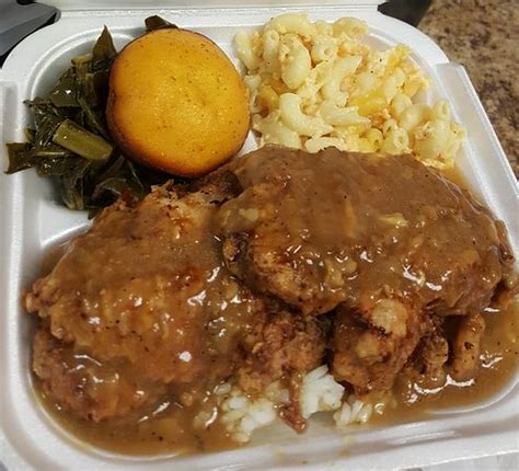 Like any good southern thanksgiving dinner, we included soul food classics like collard greens, buttermilk biscuits, and even a southern thanksgiving turkey. Smothered Pork Chops Dinner - Picture of Jack-Ham's Soul ...