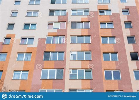 Colorful Modern Tower Building Facade In A Small City Stock Image