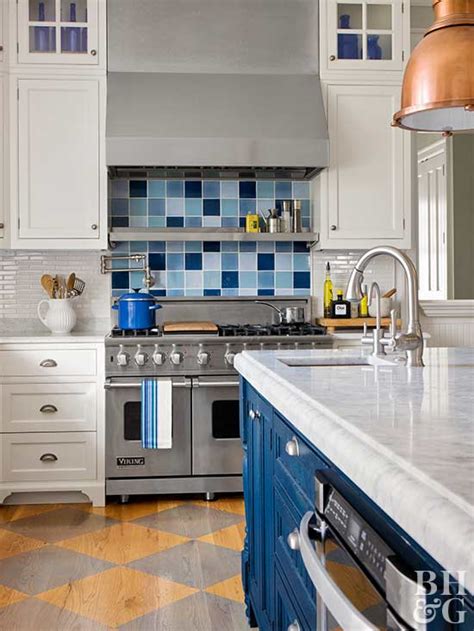 Gray minimalist kitchen with pop of orange. Painted Floor Ideas for the Kitchen