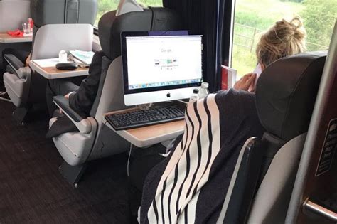 Look Commuter Snaps Photo Of Passenger Using Full Computer