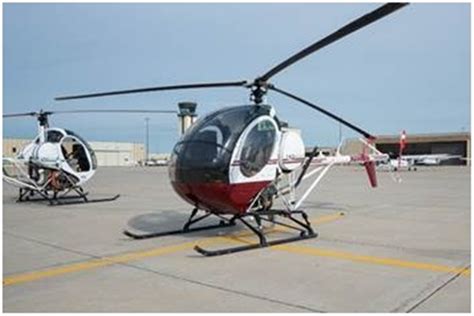 Light helicopter with a turbine engine with good hovering ability in high altitude and hot weather operating conditions. N2081G Schweizer 300C C/N S1845