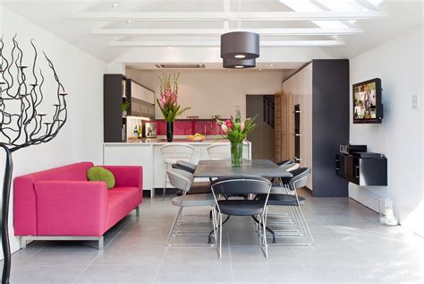 Open plan dining room and kitchen is more common as making them directly connected/share the space is more practical. Pink Sofas: An Unexpected Touch Of Color In The Living Room