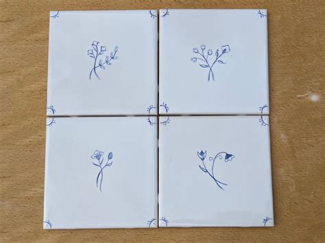 Set Of Four 6 Hand Painted Tiles Background Glaze Is Off White