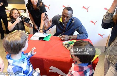 Welcomes Usain Bolt For Book Signing Of His Autobiography Faster Than