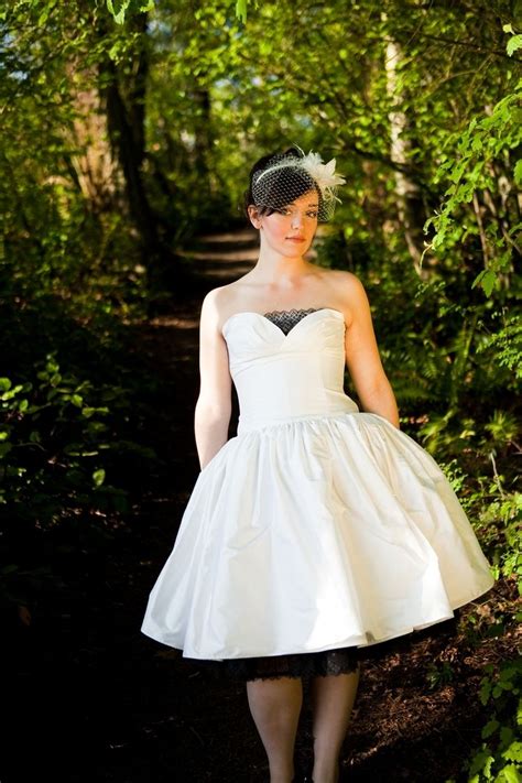 In preparation for the celebration must take into account every detail, so that nothing marred this joyful day. Hand Made Black And White Short Silk Wedding Dress by ...