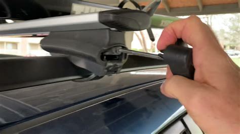 Removing Thule Roof Rack From Car Youtube