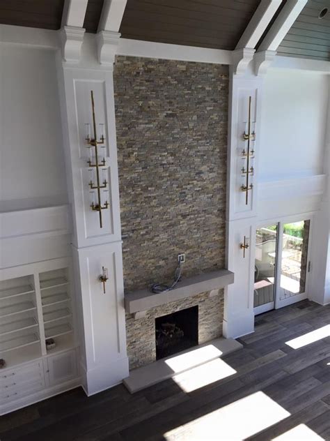 Dramatic 2 Story Stacked Stone Fireplace Macklin Design With Patrick