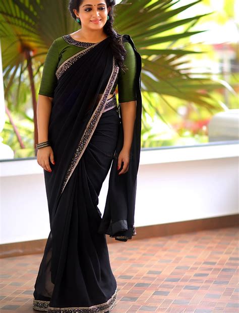 Beauty Galore Hd Kavya Madhavan Stunning In Black Saree Photoshoot