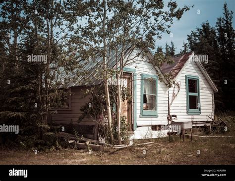 Old Rustic Wooden House In The Yukon Canada In Summer Processed For A