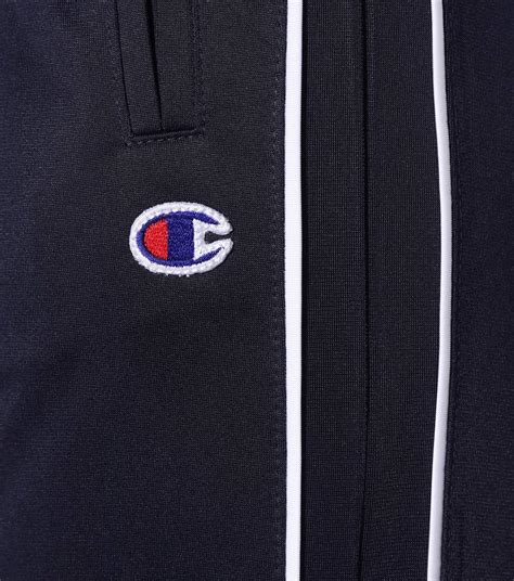 Take The Track To The 70s In These Champion Pants Take