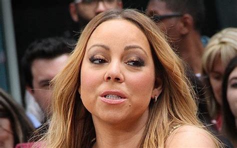 Oh Mimi Mariah Carey Has A Nip Slip In Sexy Black Dress